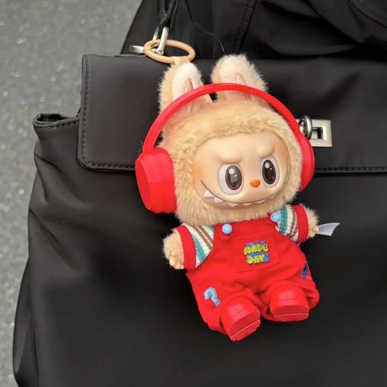 Red overalls suit—A24