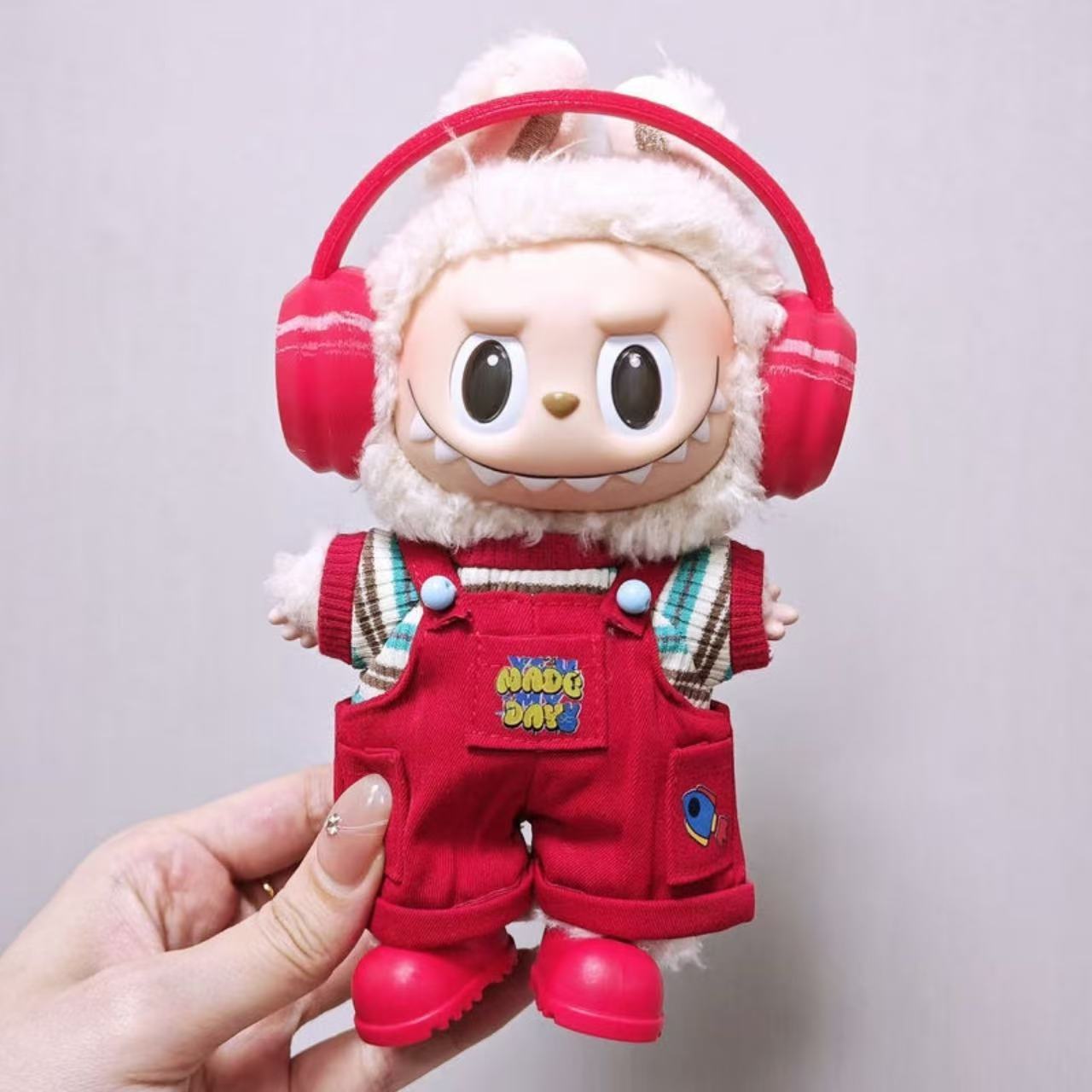 Red overalls suit—A24