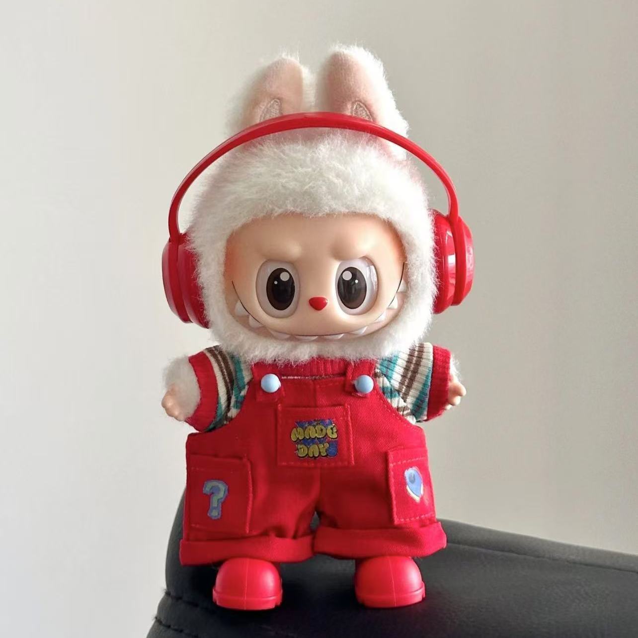 Red overalls suit—A24